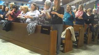 Sacred Heart women singing Go make a Difference at the end of Mass after their ACTS retreat