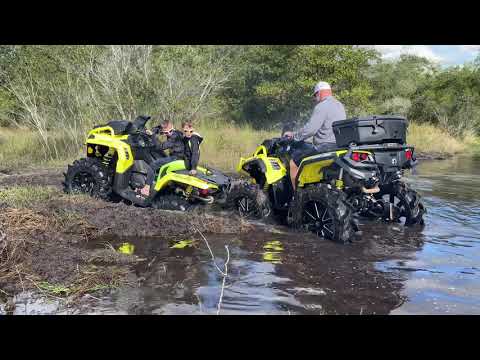 2019 outlander 850 Xmr on 4 inch portals and a 2019 Renegade 1000 Xmr playing in the mud