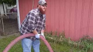 CT Brown Sanitation pumps a septic tank