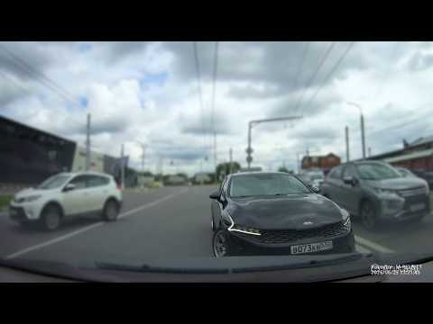 Gas station gridlock, new road markings, and oncoming drivers on the right!