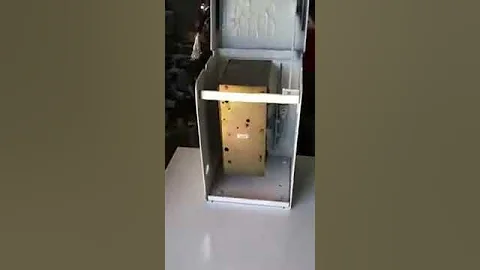 Installing a coin mechanism with a hammer
