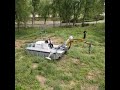 Amphibious aquatic weed removal harvesting machine