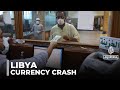 Libya Cuts Currency Value By Nearly 15 Many People Are Struggling To Afford Basic Goods