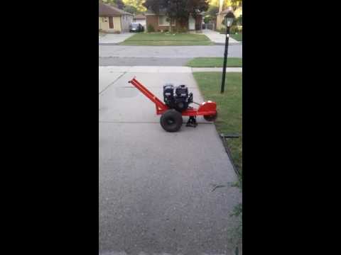 My home made stump grinder breaking in the  new motor