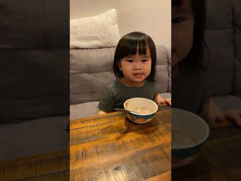 2years-baby-doing-her-funny-face-when-she-eat-ice-cream