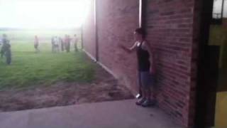 Kid doing a crazy backflip off a pillar