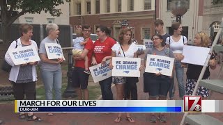 Vigil held in Durham after weekend mass shootings kill 29