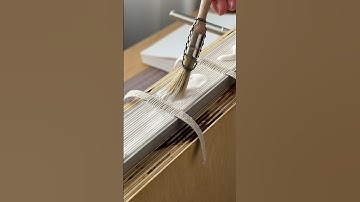 Rounded spine bookbinding process