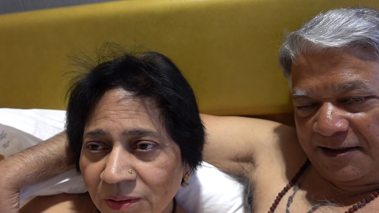 Aruna & Hari Sharma relaxing at Holiday Inn Beijing Airport Rm 631, Beijing China Dec 02, 2018