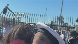 USS Lincoln sailor hugs baby for first time