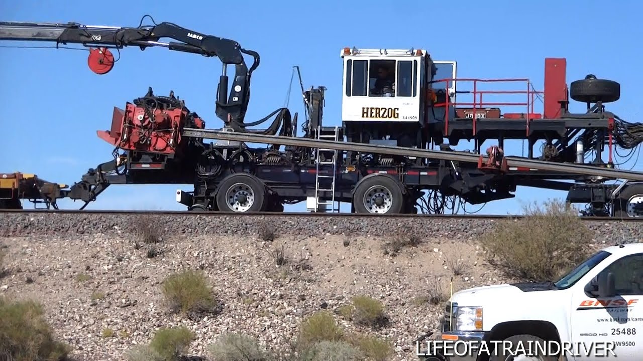 Herzog Rail Unloading Machine - Close Up View Dropping Welded Rail ...