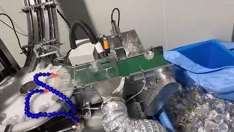 Automatic two head jar cap lid wadding foil lining machine