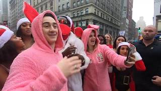SantaCon 2019 - Thousands of Santa Clauses flood the streets of New York City