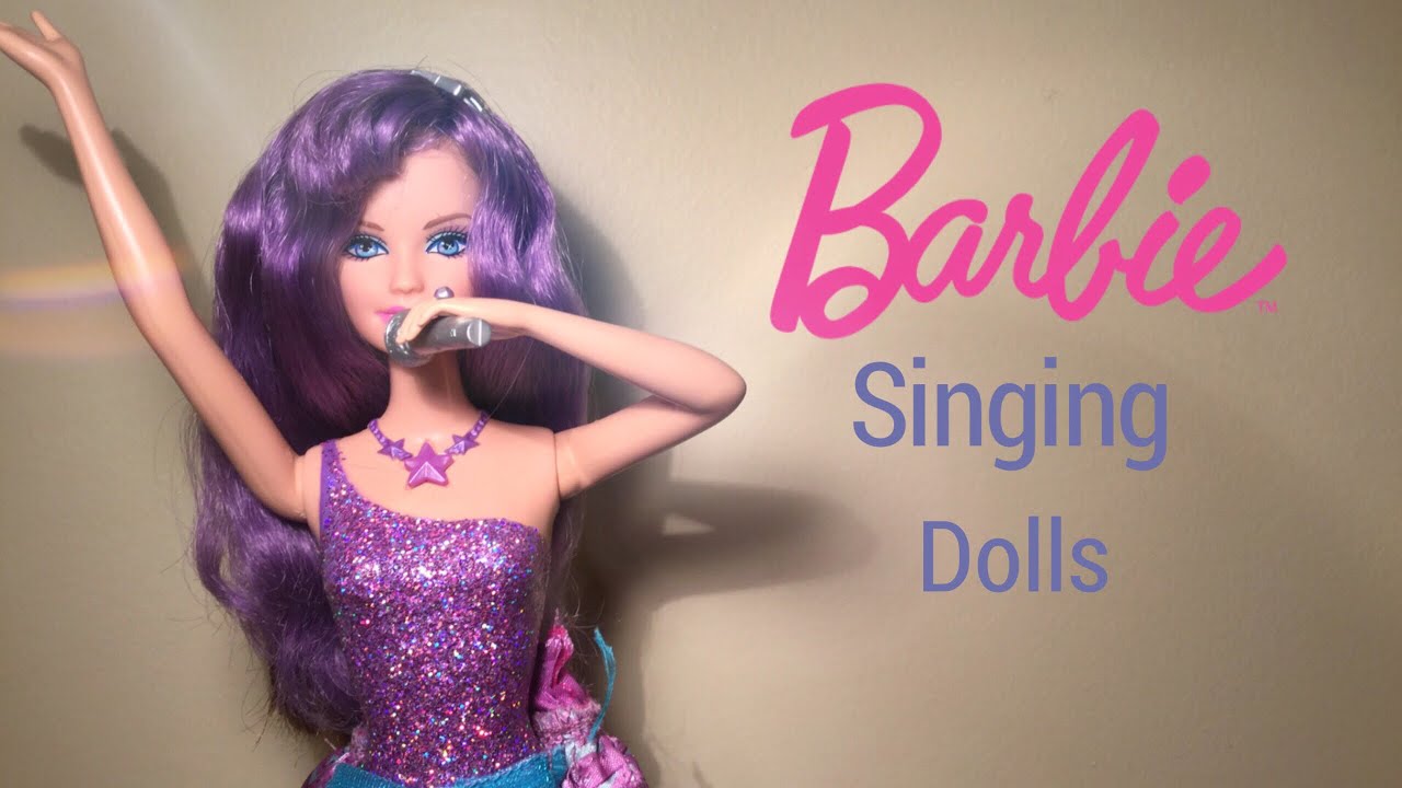 Dolls sing. Barbie Singer Doll. Син Сонг Барби. Barbie as Singer. Кукла Barbie Sings Rockin around the Christmas.