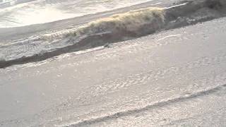 Blowing Dust On Duststop Treated Stormwater Retention Pond