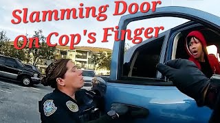 22*Year*Old Turns Ticket Into Arrest By Slamming Door On Cop's Finger