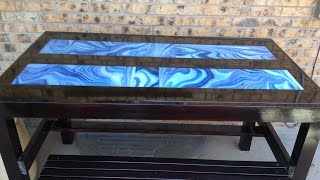 Resin table top with art glass underlay