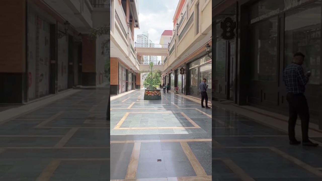 Big gallery space between shops at AiPL Joy Street Gurgaon 