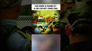 This Biker Is Pushed by a Cop for Not Complying
