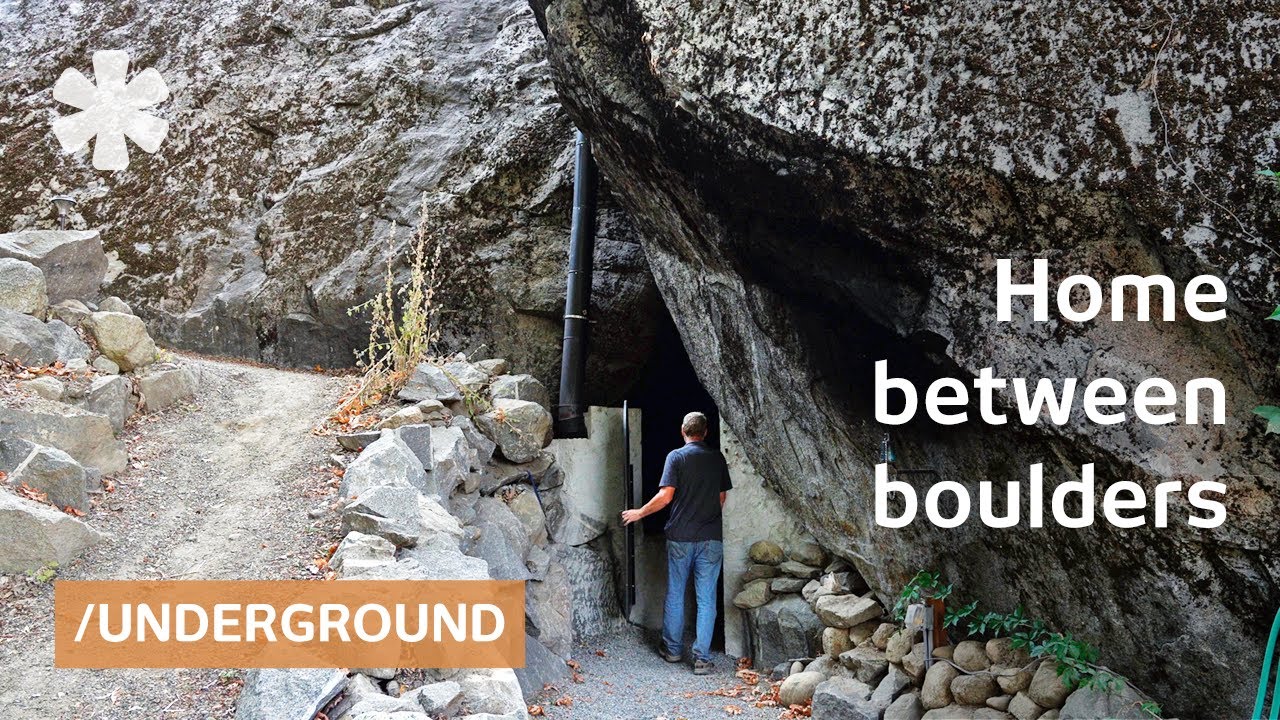 Bought rocky lot, created megalith home amid boulders