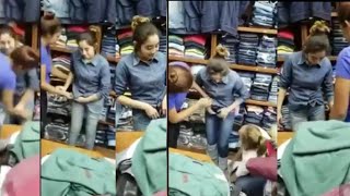 Woman Caught on Camera|Lady Thief caught on Camera|Remove cloth on Shop