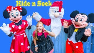 Assistant has a Holiday Hide n seek with Santa and Mickey