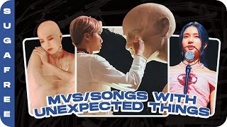 kpop mvs/songs with unexpected/surprising things