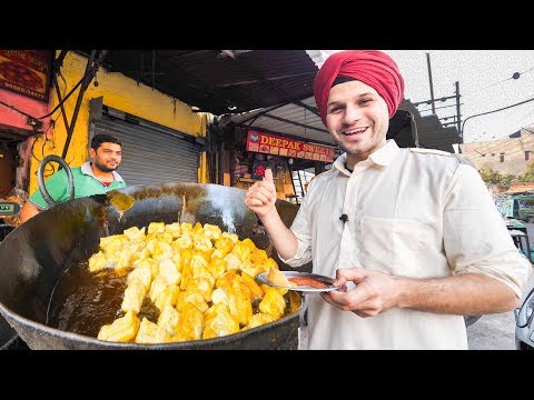 The Heat of the Curry Master's Kitchen on a Busy Friday Night at Shambhala Village Indian Restaurant. 