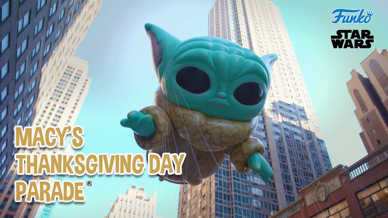 Curbside View of Funko themed STAR WARS™ Grogu Balloon At Macy’s Thanksgiving Day Parade