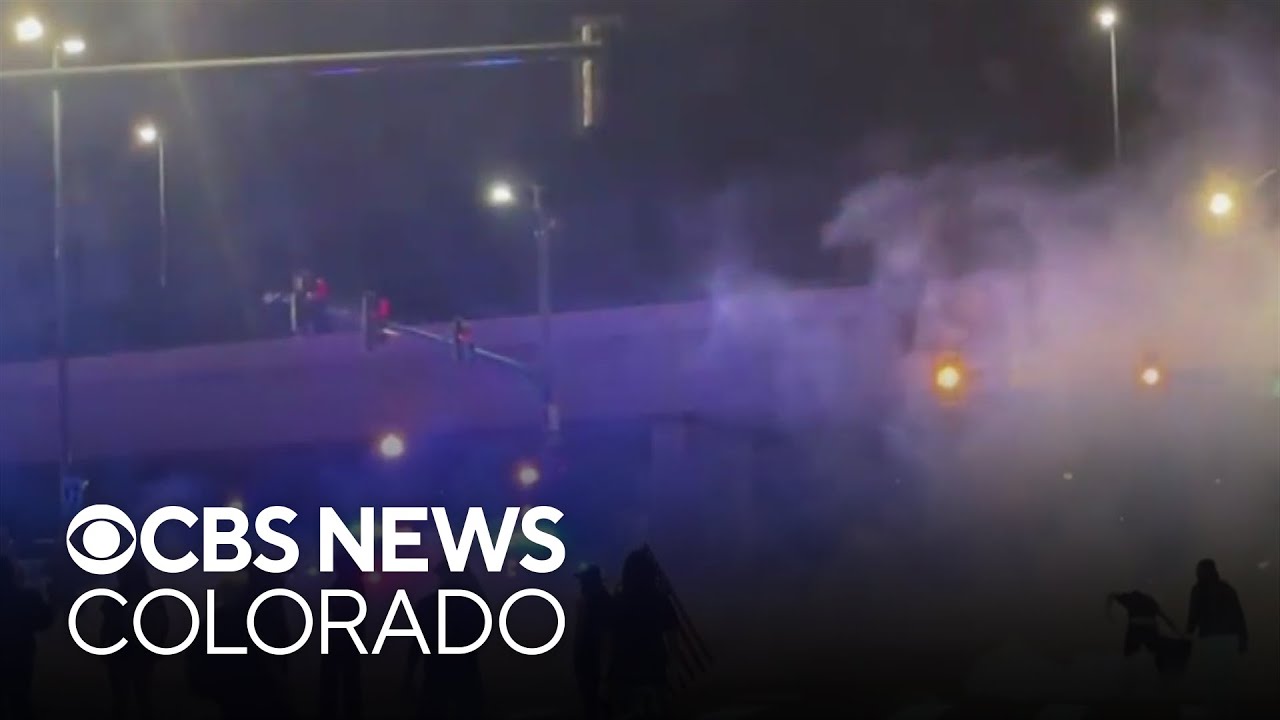 Police confront Denver marchers upset with ICE in chaotic exchanges downtown