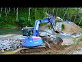 Mini Excavator Working On The River