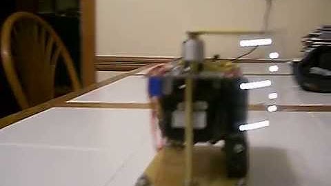 Basic Stamp (Parallax) Clock, Scanning LED Marquee display using stepper motor