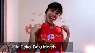 Mari kita pakai baju merah