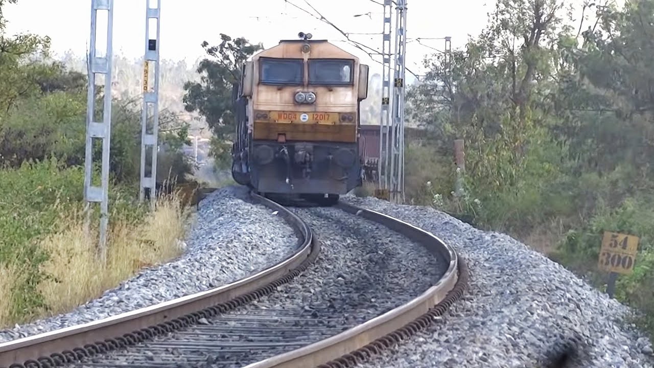 Yellow WDG-4 led freight train through the Makali ghats!!