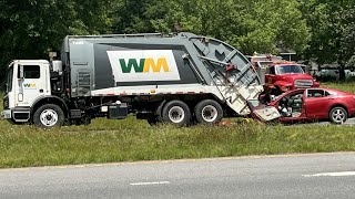 Scene Video: Crash involving trash truck and sedan leaves one dead
