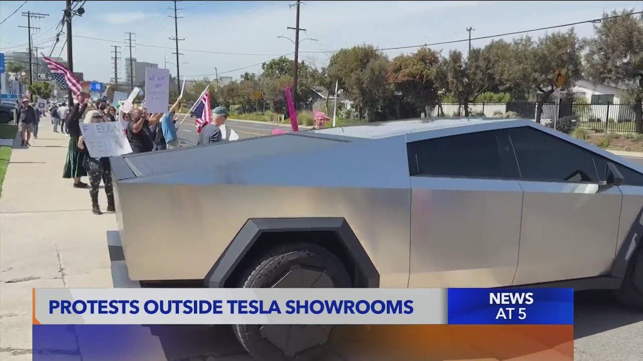Protests outside Tesla showrooms - YouTube