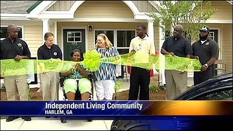 Open House, Ribbon Cutting Held At Planer Mill Village