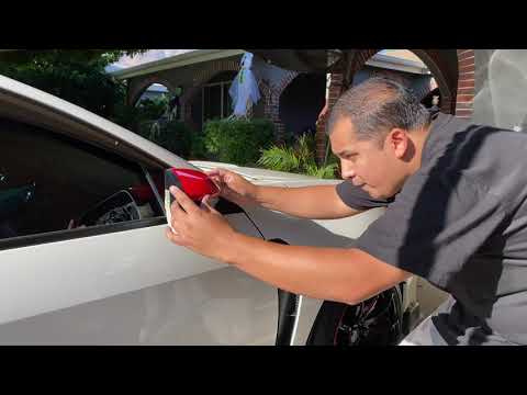 Video: Paano mo aayusin ang isang mirror sa gilid sa isang Honda Civic?