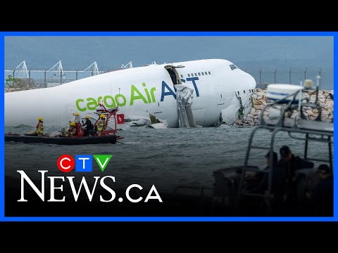 Two workers killed after Boeing 747 cargo plane skids off runway in Hong Kong