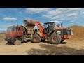 Hitachi ZW220 loading Tatra 815s1 part 1