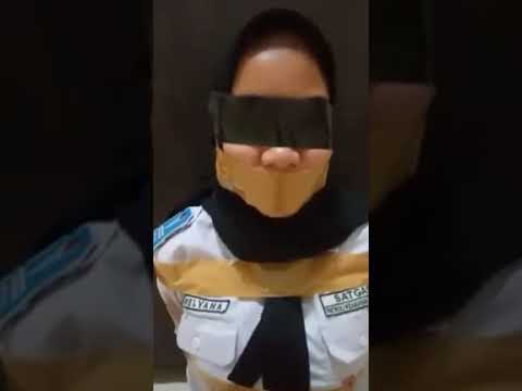 indonesian girl officer tape gagged and bound and gagged