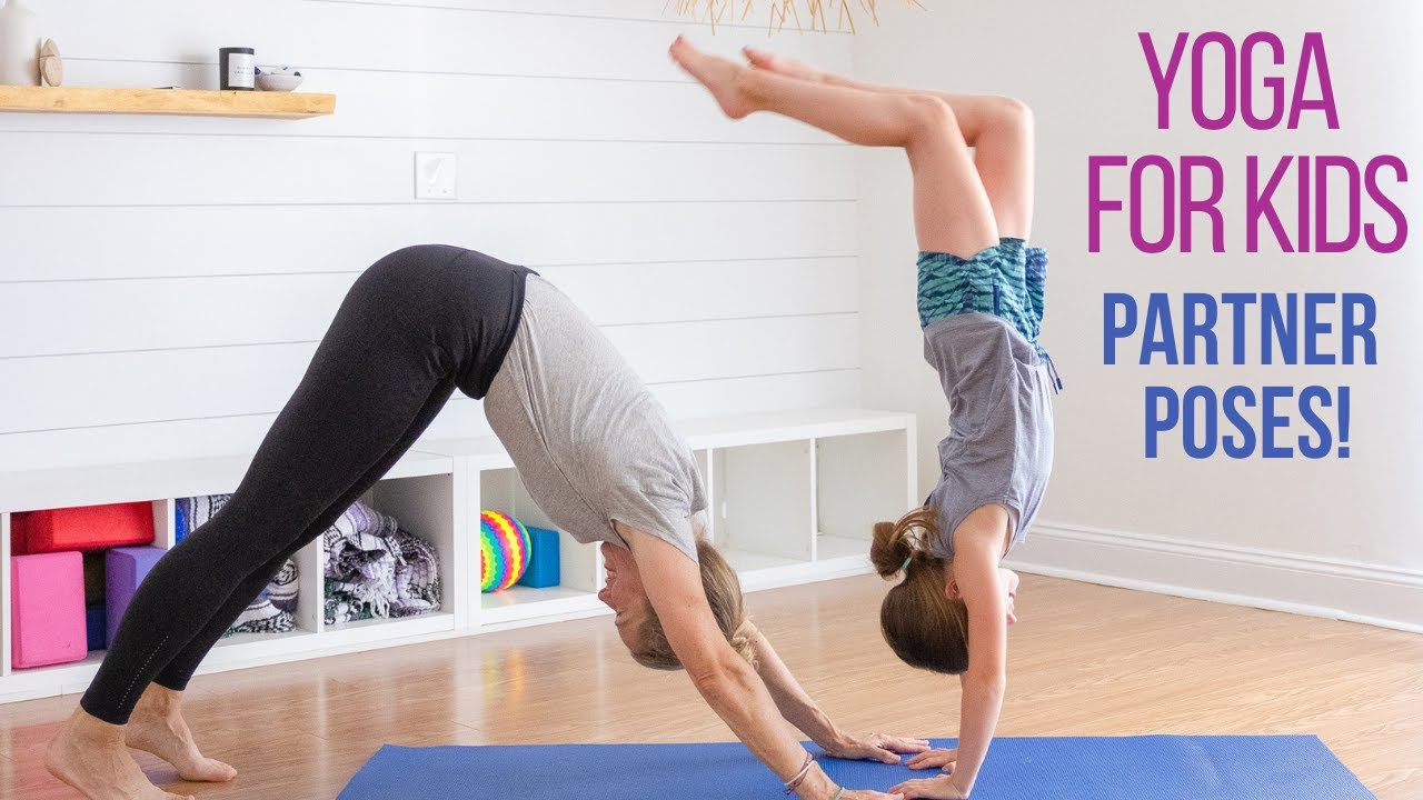 Little girl practicing yoga on white background Stock Photo - Alamy