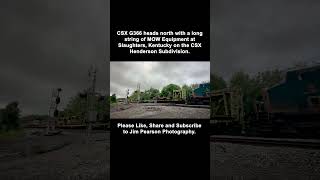 CSX G366 heads north with a long string of MOW Equipment at Slaughters, Kentucky.