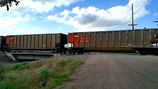 BNSF 9227 leading empty coal train west 