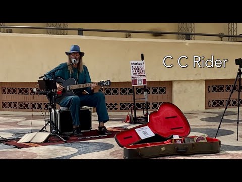 Busking in Alicante, Spain - C C Rider