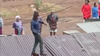 Shuka Upigwe Phone Er Jumps Onto House Roof After Being Cornered By Angry Residents