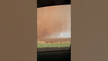 Race to Safety: Tornado Sweeps Red Dirt & Approaches Cars in Texas