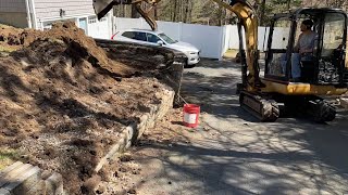 Let’s fix a crazy Tetris block style retaining wall that failed