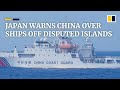 Diaoyu-Senkaku islands spat deepens as Japan warns China over coastguard ships in East China Sea