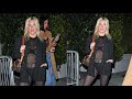 Singer kesha strikes a pose for photographers after attending an event at bar marmont in la